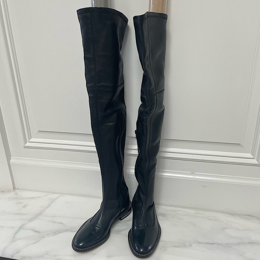 Givenchy women’s chain trimmed stretch leather over the knee boots.